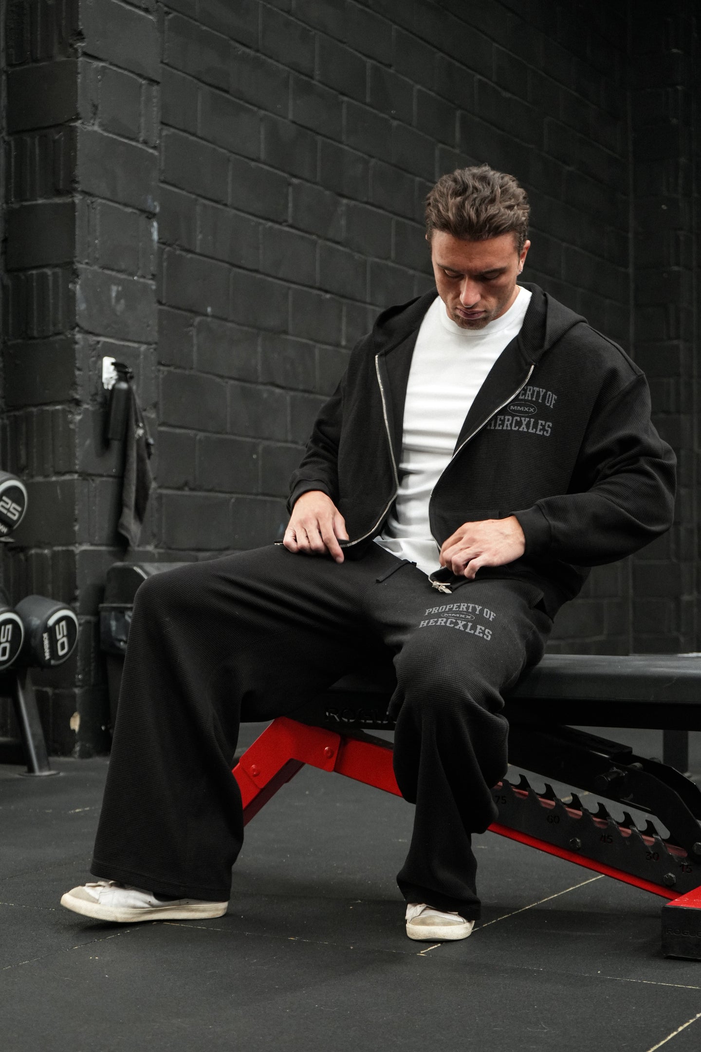 HERCXLES Property Of Waffle Barrel Leg Sweatpants - Black seated model detail