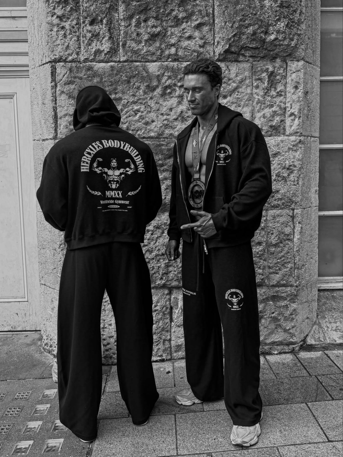 Worldwide Competitor Sweatpants - Black / White model pullover back and zip hoodie front with joggers (p9)