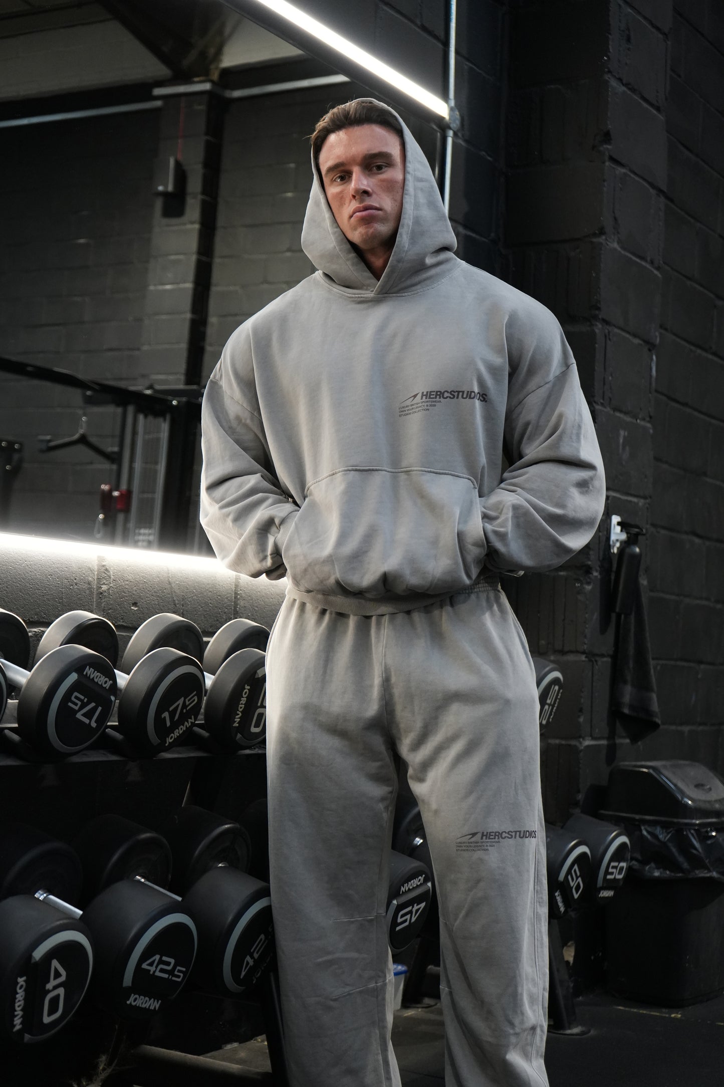 HERCSTUDIOS Boxy Hoodie model fit reference in Light Grey - straight-on front
