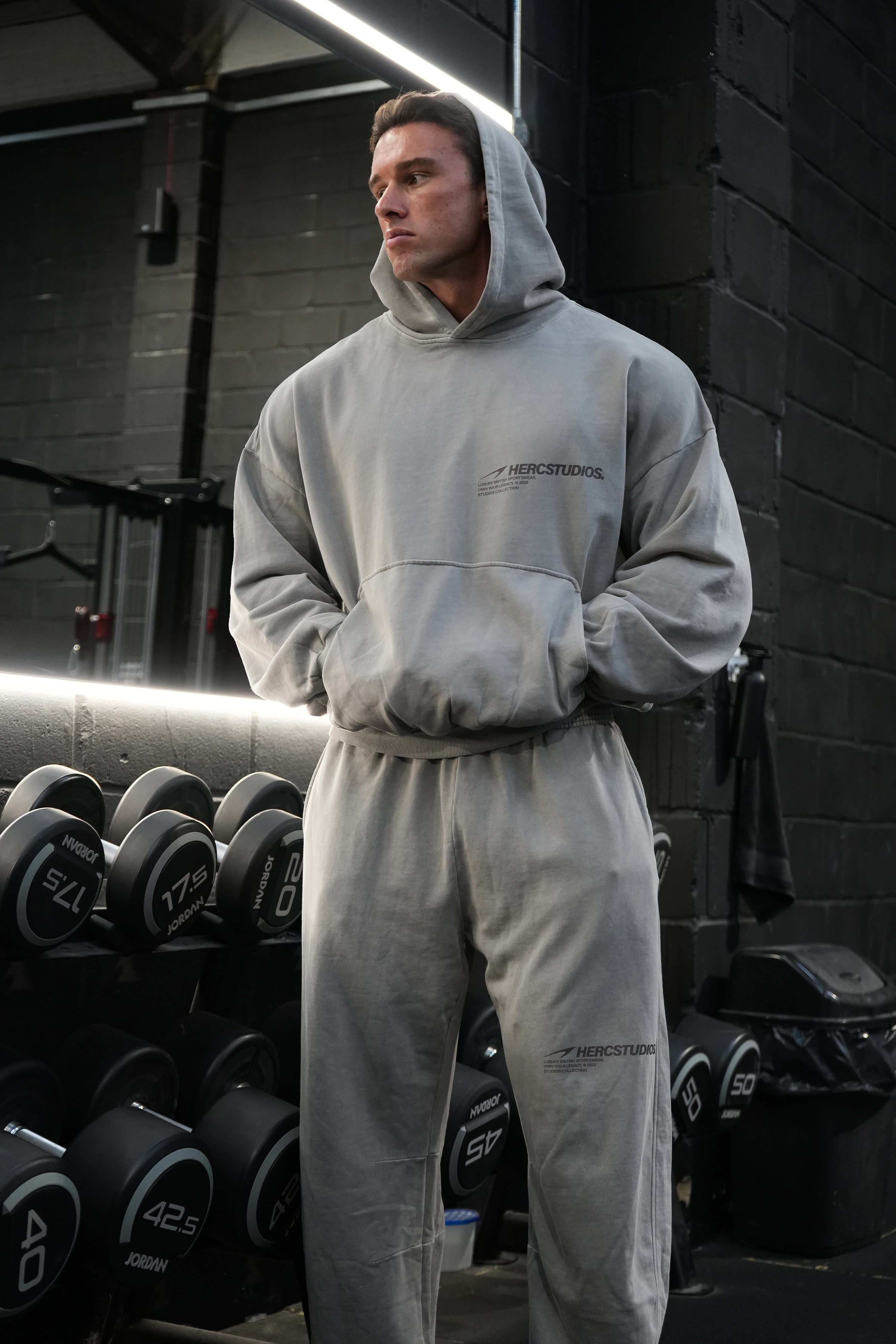 HERCSTUDIOS Boxy Hoodie model fit reference in Light Grey - hood up front
