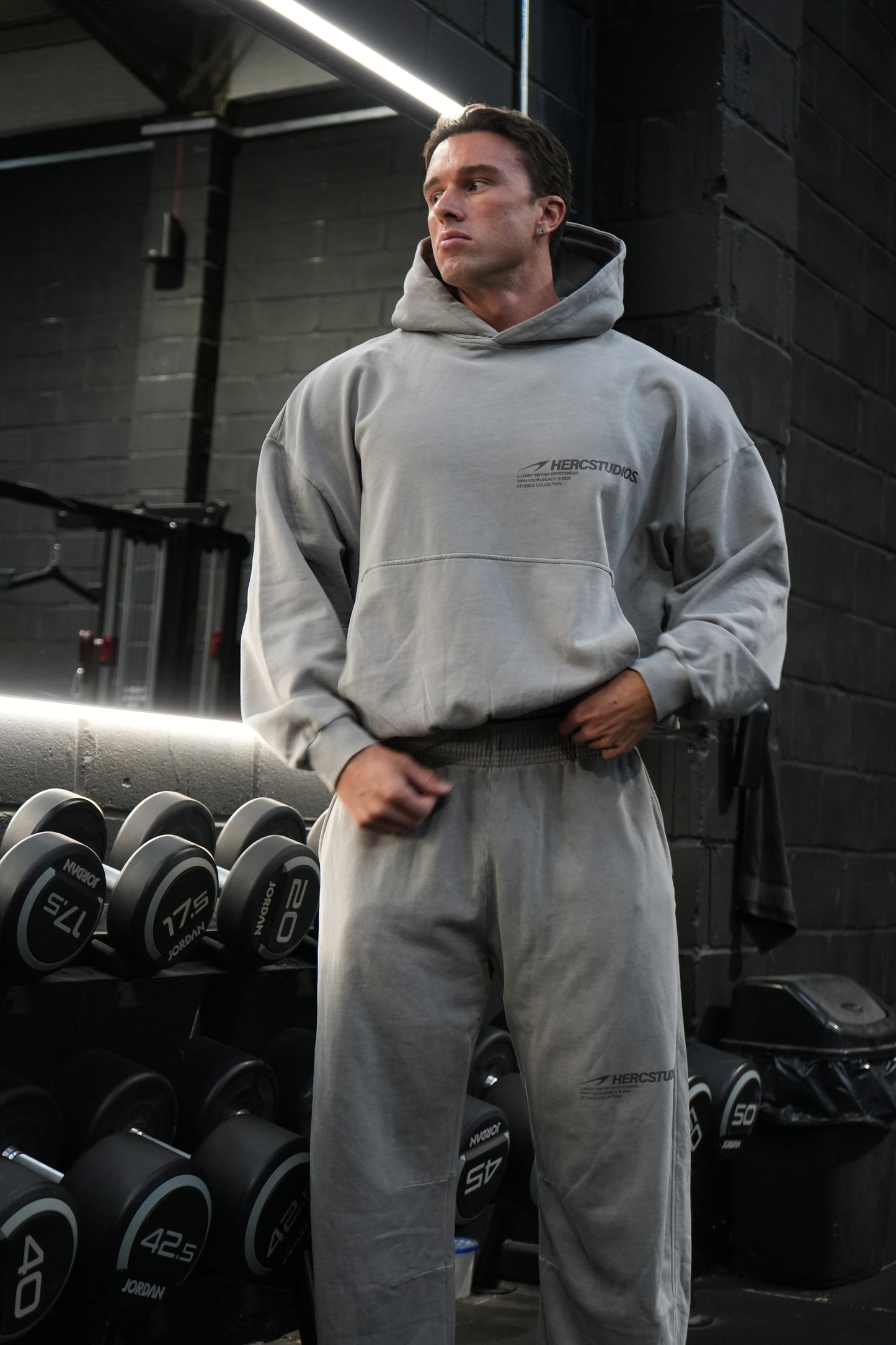 HERCSTUDIOS Boxy Hoodie model fit reference in Light Grey - hood down front