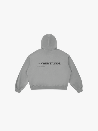 HERCSTUDIOS Boxy Hoodie - Light Grey back flat lay