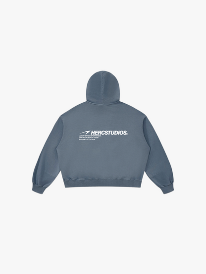 HERCSTUDIOS Boxy Hoodie - Blue Grey back flat lay