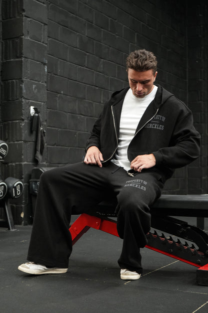 HERCXLES Property Of Waffle Boxy Zip Hoodie - Black seated model detail